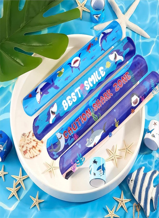 سنابترون هدايا سنابترون بيبي شارك لأعياد ميلاد الأطفال - 12 سوارًا قابلًا للصفع للبنات والأولاد، بتصميم بيبي شارك، زينة أو لوازم حفلات / هدية عيد ميلاد للأولاد / هدايا تذكارية لأعياد الميلاد - Image 5